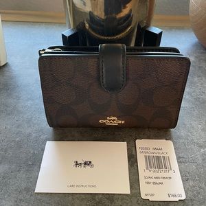 Coach monogram wallet- Brand new with tags.